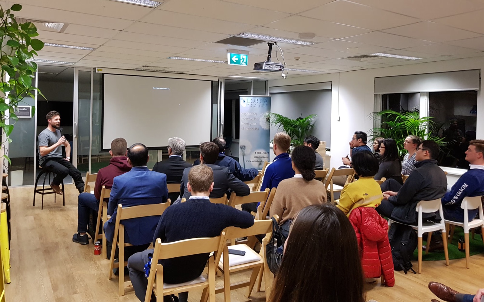 Dr. Joe Logan speaking at a Sydney Healthcare AI & Data Science meetup at Lorica Health
